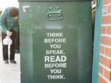 books over green trolley bin