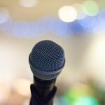 selective focus photography of microphone